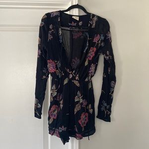 Size S/M black romper with floral print